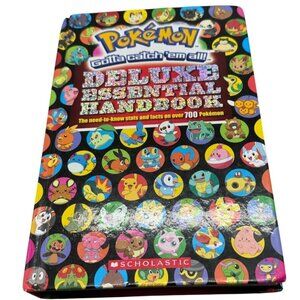 Pokemon gotta catch'em all deluxe essential handbook hardcover scholastic READ